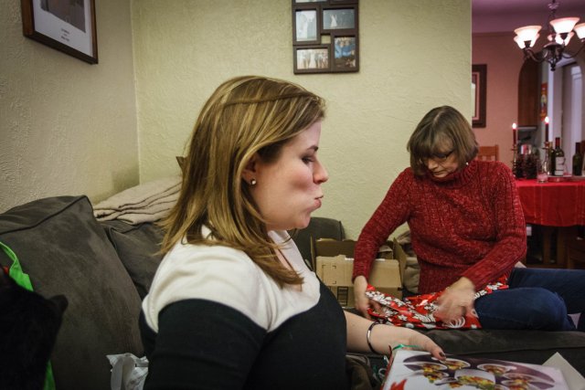 Julia Miller opening a present